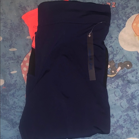 Pants - Women’s blue mesh panel leggings nwot